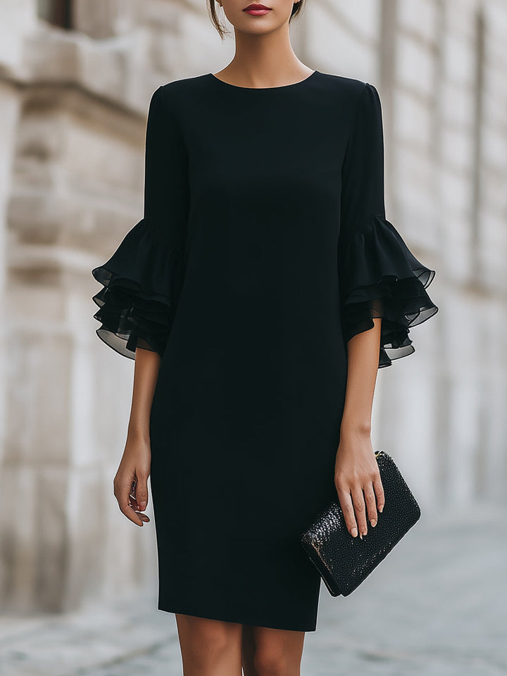 Modest women's black ruffled sleeve midi dress, suitable for funerals, formal events, or elegant occasion wear.