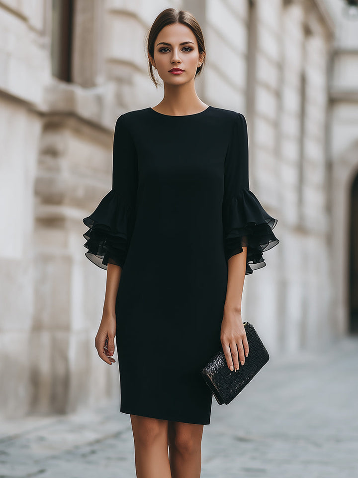 Sophisticated black midi dress for women, featuring elegant ruffled sheer sleeves and a timeless silhouette.