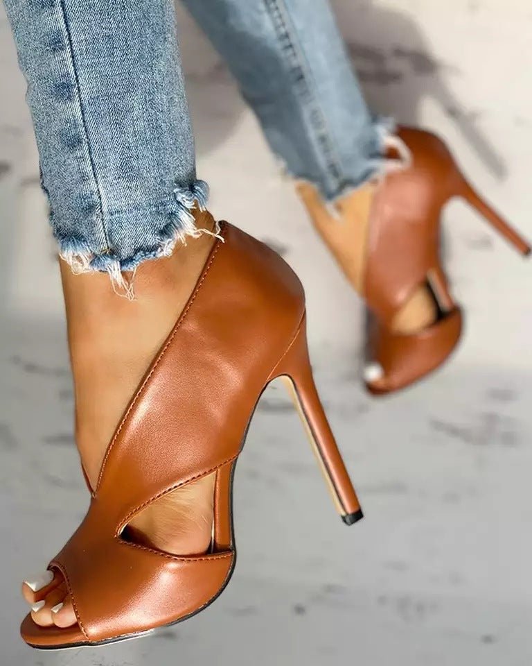 Women's elegant black open-toe cutout stiletto heels, perfect for parties & dress wear. Chic fashion footwear.