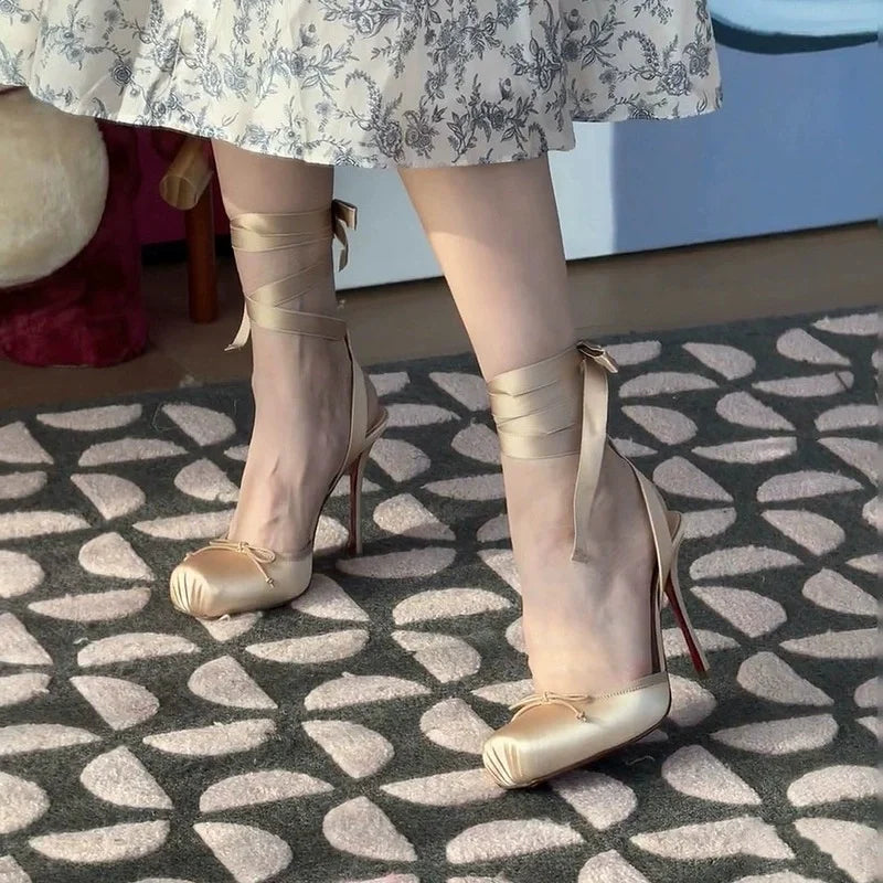 Fashionable women's high-heeled platform shoes with an adjustable ankle strap, perfect for formal & party outfits.