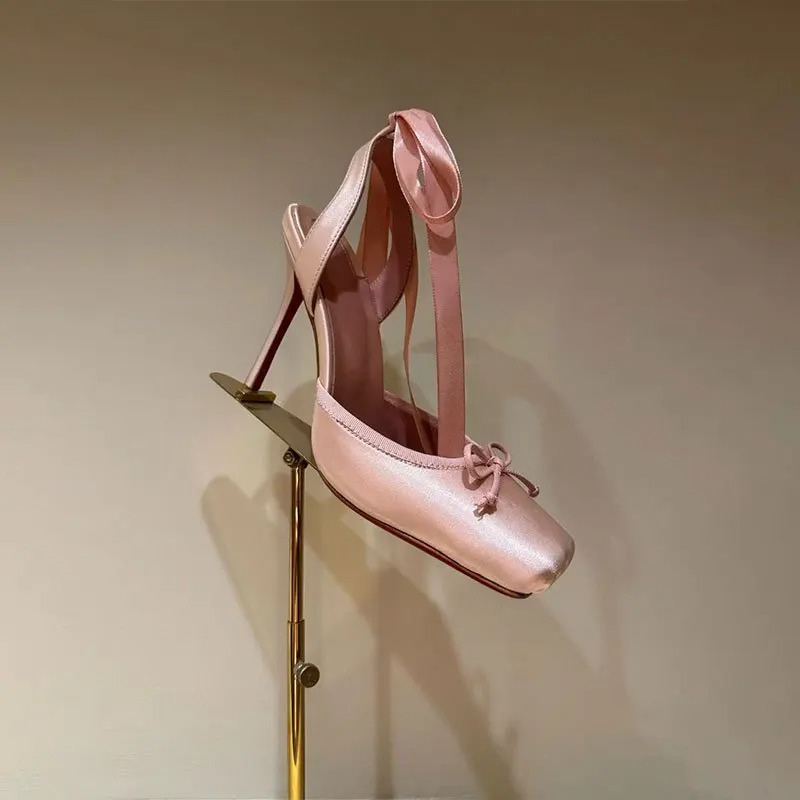 Chic women's platform court shoes with a secure ankle strap, offering style & elegance for any formal gathering.