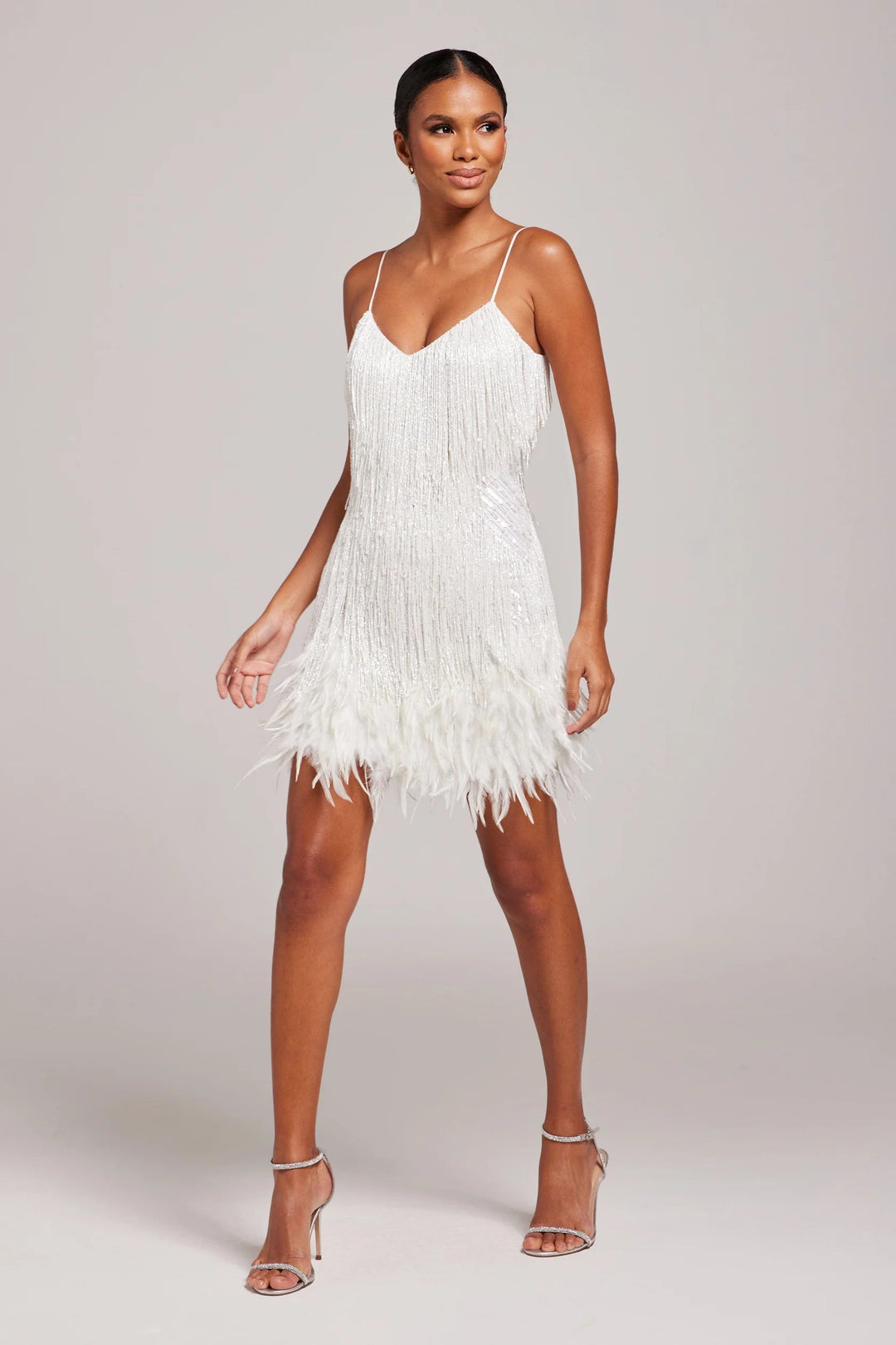 Glamorous women's fringe party dress, sleeveless design perfect for evening wear and events.