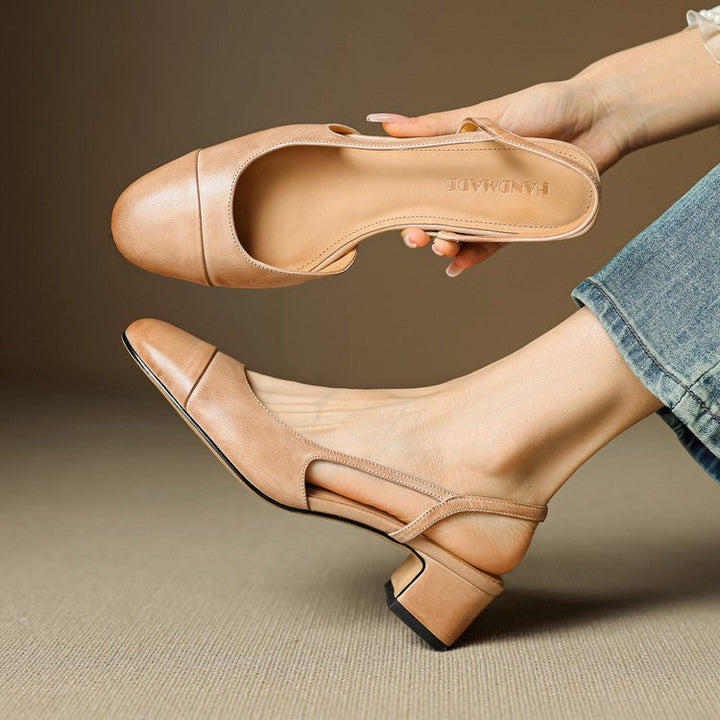 Classic black almond toe slingback pumps with comfortable block heels for women.