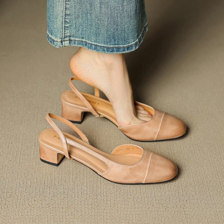 Stylish women's black slingback block heel pumps, perfect formal shoes for work & evening.