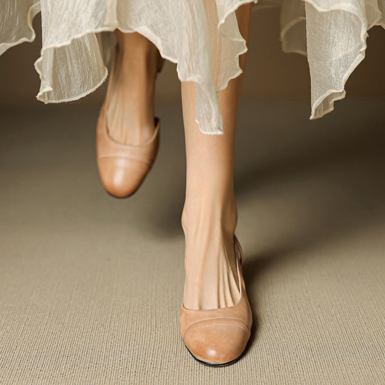 Comfortable black slingback block heel pumps for women, an elegant choice for daily office wear.