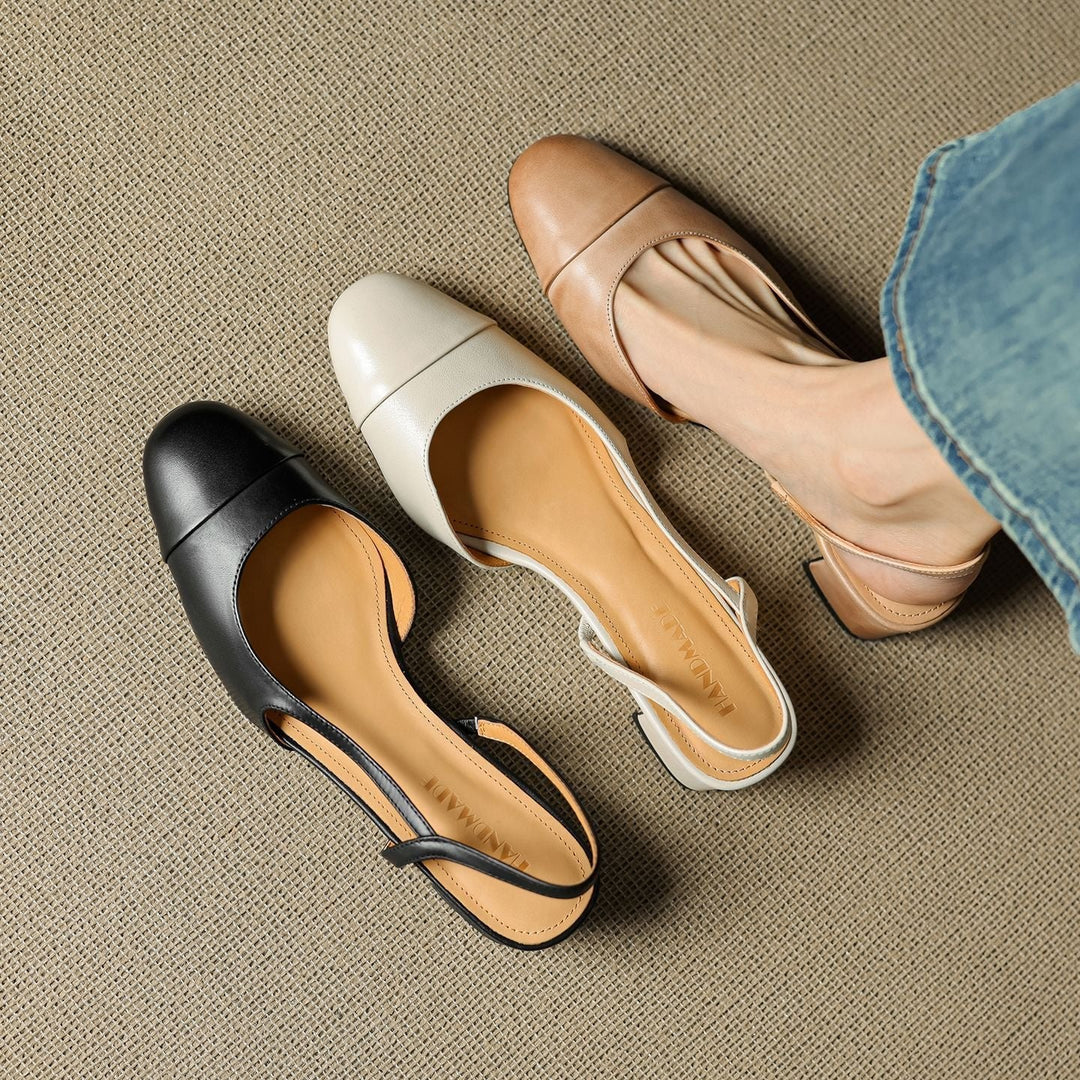 Premium women's black slingback block heel pumps, sophisticated & comfortable for all-day wear.
