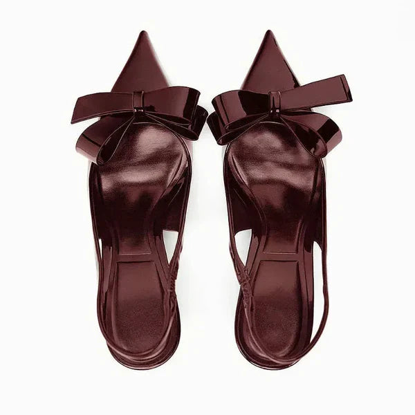 Fashionable women's dress shoes: slingback heels with a sophisticated pointed toe and bow