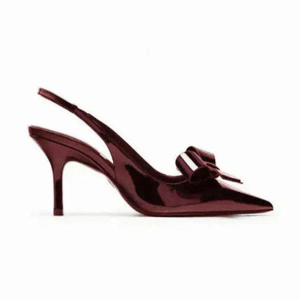 Elegant party heels for women, showcasing a refined pointed toe and decorative bow