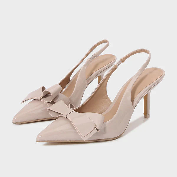 Chic women's slingback heels, perfect for formal occasions, with a striking pointed toe