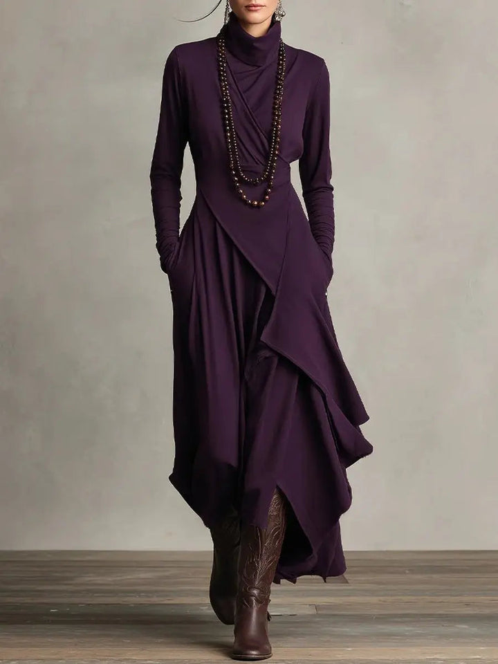 Women's elegant black turtleneck long sleeve maxi dress with stylish asymmetric hem.