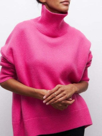Premium women's black turtleneck sweater. Elegant, warm, & cozy knit for comfortable fall & winter styling.