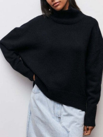 Versatile black long sleeve turtleneck sweater for women. Comfortable, warm & stylish fall fashion apparel.