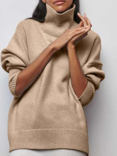 Cozy women's black turtleneck sweater. Elegant and warm knit for cold weather, a chic winter fashion essential.