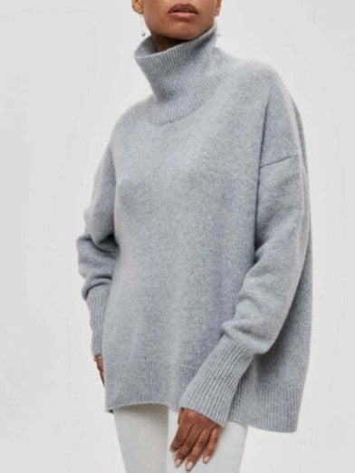 Stylish black turtleneck sweater for women. A warm & cozy knit, perfect for chic fall and winter outfits.