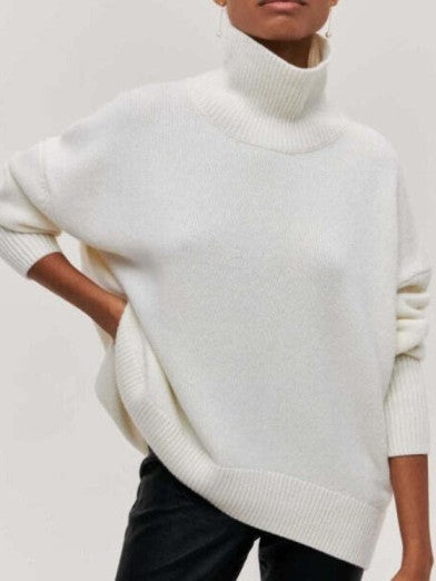 Comfortable women's black turtleneck. Elegant, warm long sleeve sweater, a versatile addition to any wardrobe.