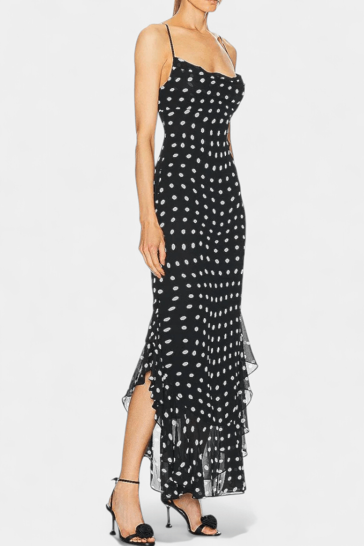 Timeless women's polka dot dress featuring adjustable straps and a flattering, flowy silhouette for any occasion.