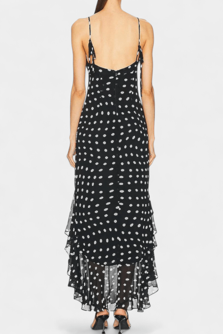 Cute women's polka dot midi dress with adjustable straps, ideal for elegant casual summer wear & comfort.