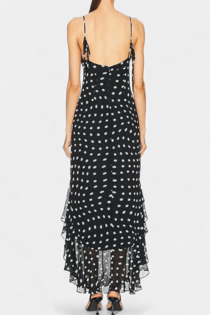 Cute women's polka dot midi dress with adjustable straps, ideal for elegant casual summer wear & comfort.
