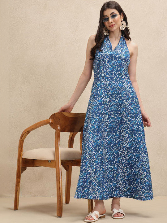 Elegant women's A-line floral halterneck maxi dress with a blue pattern, ideal for summer fashion & parties.