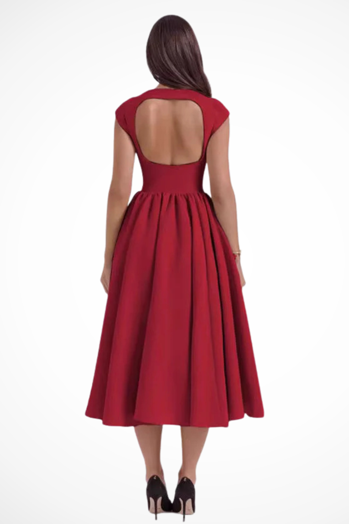 Boat neck midi dress for women with cap sleeves, ideal as a stylish wedding guest or party dress.