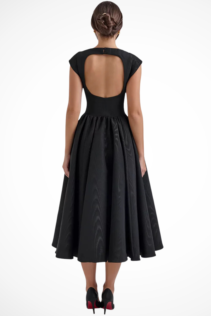 Elegant black boat neck cap sleeve midi dress. Perfect women's formal, cocktail or wedding guest attire.