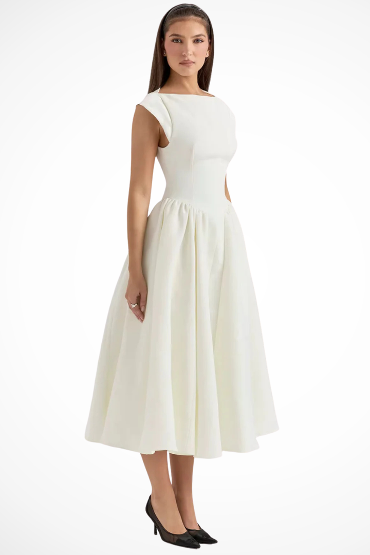 Comfortable & chic women's boat neck midi dress with cap sleeves. Perfect for elegant wedding guests.