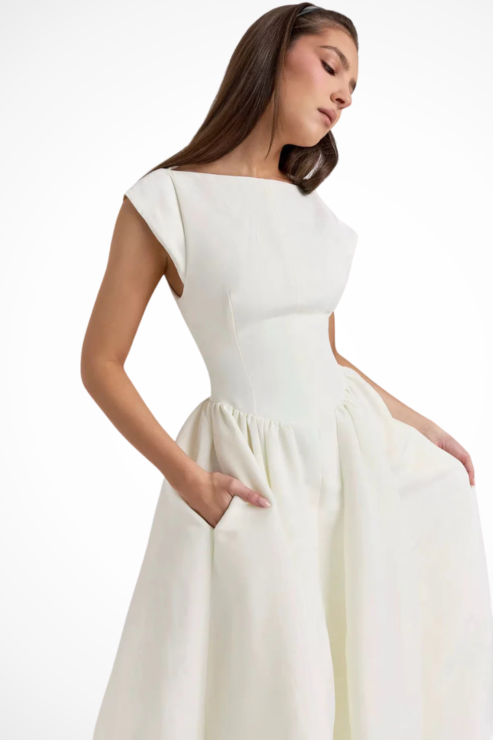 Versatile women's boat neck cap sleeve midi dress, suitable for wedding guests, cocktail & formal parties.