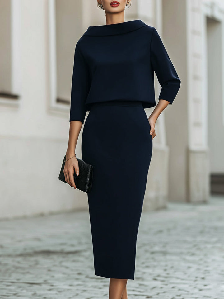 Elegant women's boat-neck top with a matching midi skirt, a stylish two-piece outfit for any event.