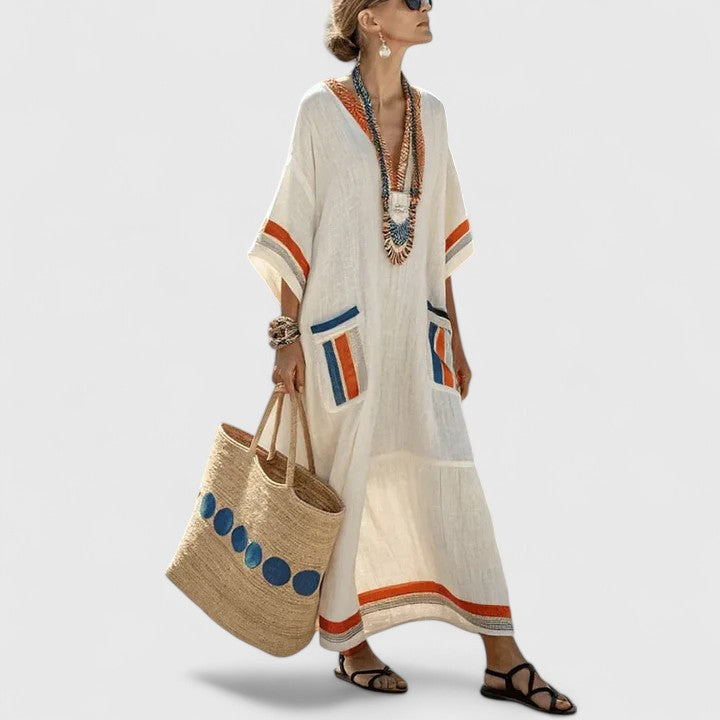 Comfortable flowy bohemian maxi dress for women, ideal casual summer and vacation wear. Elegant V-neck design.