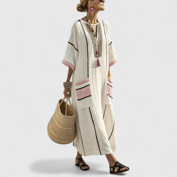 Long elegant bohemian maxi dress for women, relaxed fit summer style with V-neck. Perfect casual vacation dress.