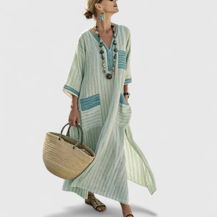 Elegant women's bohemian maxi dress, comfortable and flowy. Perfect V-neck summer dress for casual or vacation.