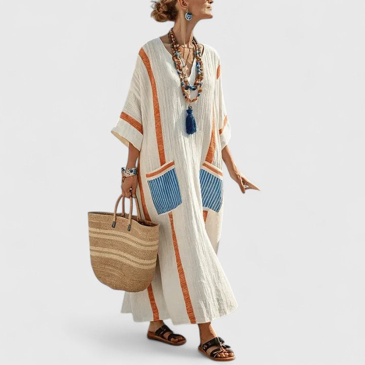 Casual long bohemian maxi dress for women, relaxed fit V-neck style. Ideal comfortable summer vacation dress.