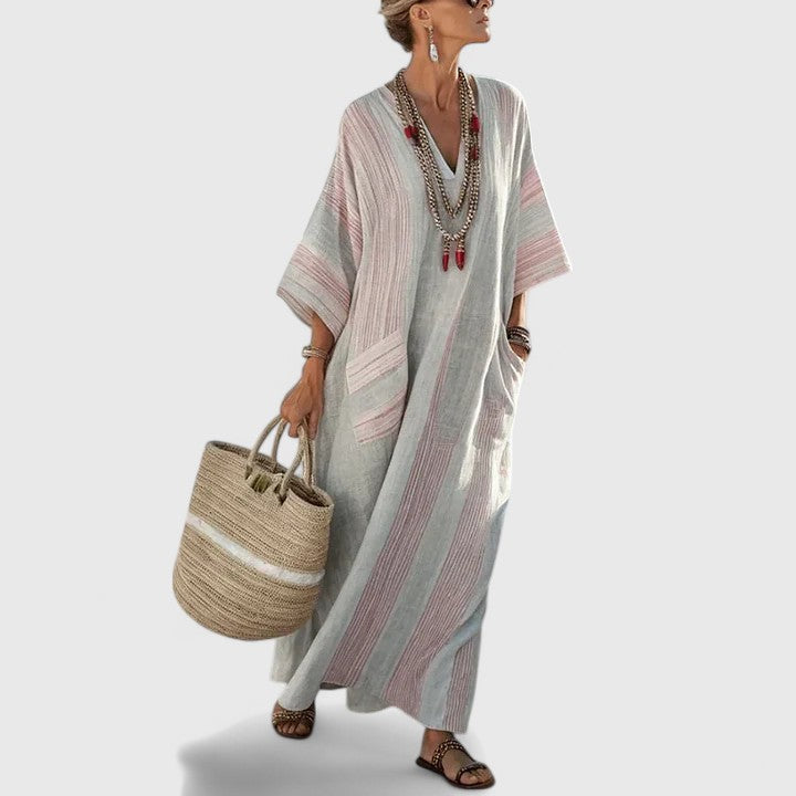 Women's elegant V-neck bohemian maxi dress, relaxed flowy fit with pockets. Comfortable for summer & vacation.