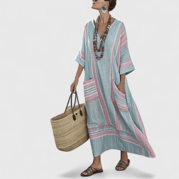 Long elegant women's bohemian maxi dress, casual V-neck summer style. Relaxed flowy fit, comfortable for vacation.