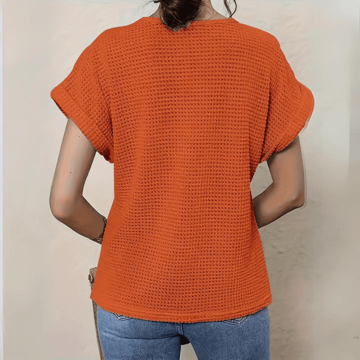 Boho chic women's Ibiza style top with a round neck and relaxed fit. Perfect for summer & beachwear.