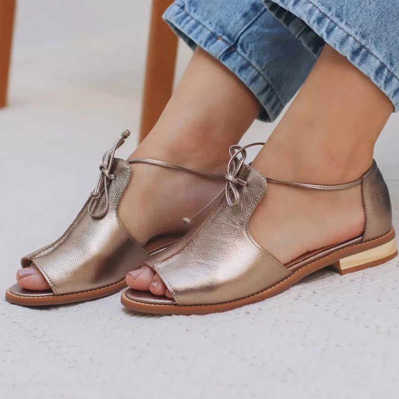 Elegant ladies' bow-tie strap sandals, versatile for casual wear or chic spring & summer outfits.
