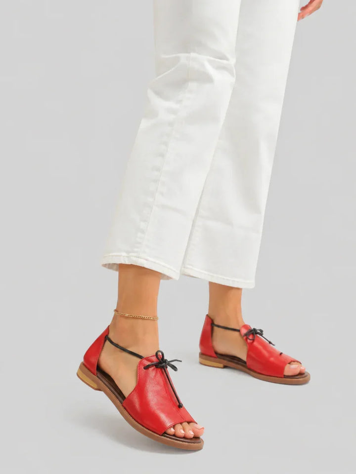 Stylish women's bow-tie strap sandals, an essential for elegant ladies' summer & spring footwear.