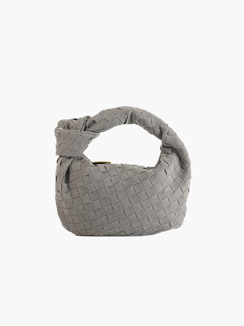 Elegant women's braided suede mini handbag, compact and chic.