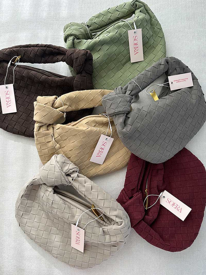 Compact braided suede women's mini bag with a refined knot detail.