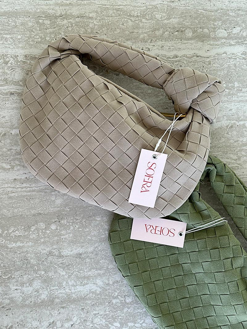 Fashionable compact suede mini bag with braided design for women.
