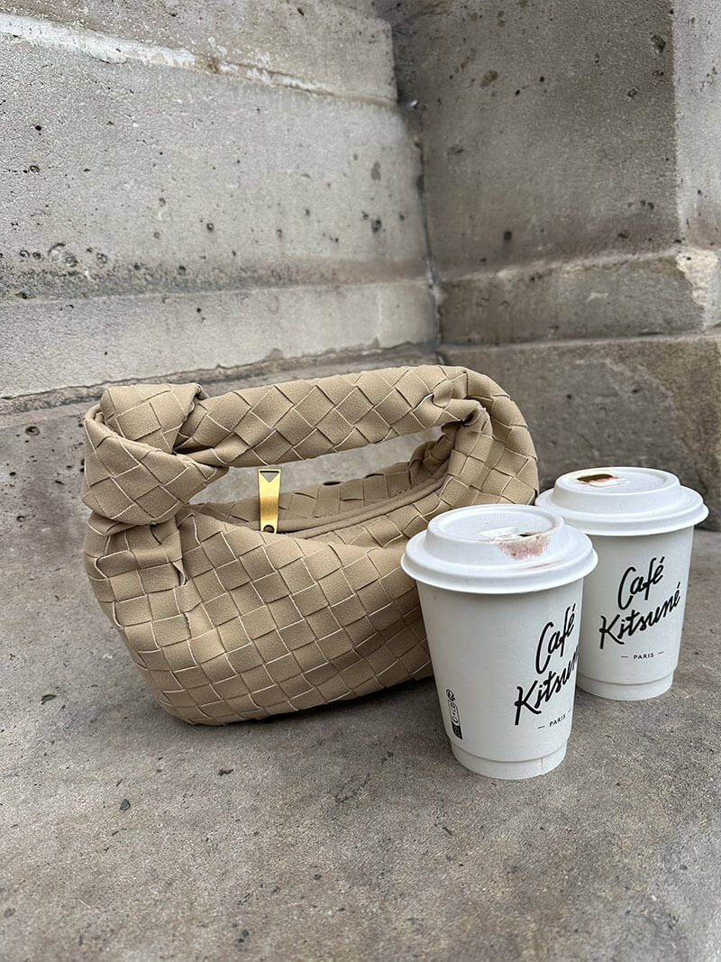 Daily accessory: elegant braided suede mini bag for modern women.