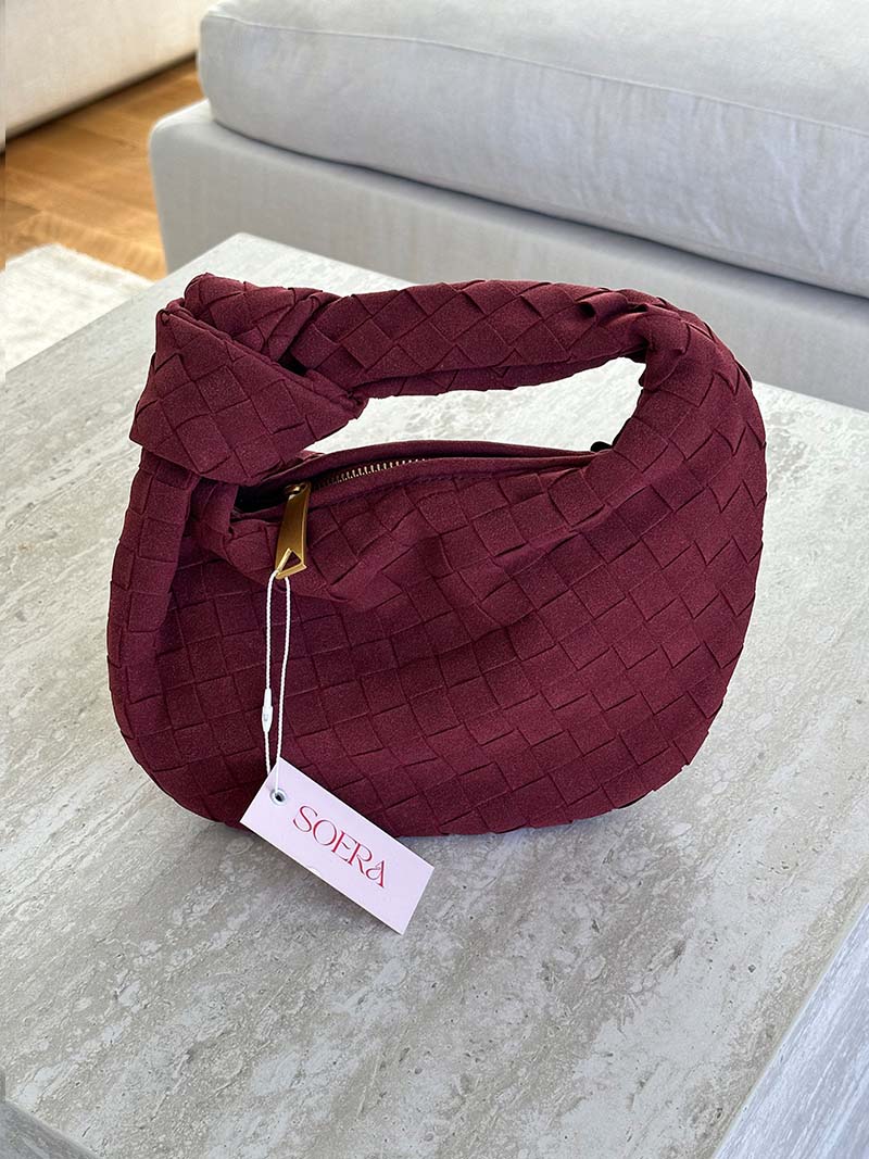 Compact women's braided suede mini handbag with refined design.