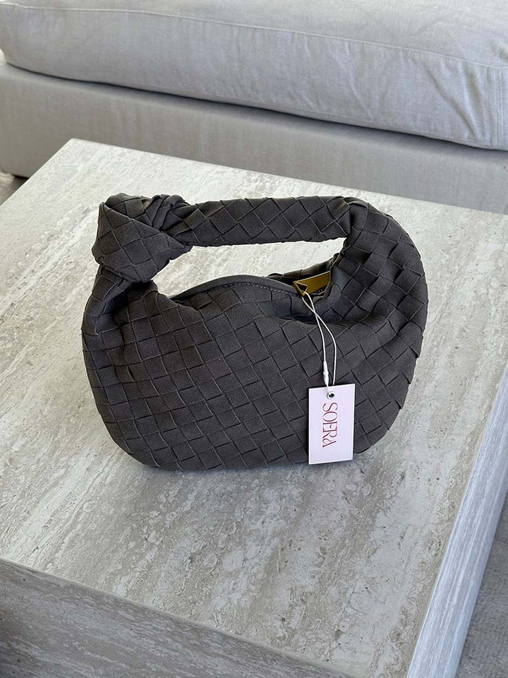 Chic women's suede mini bag, featuring a beautiful braided design.