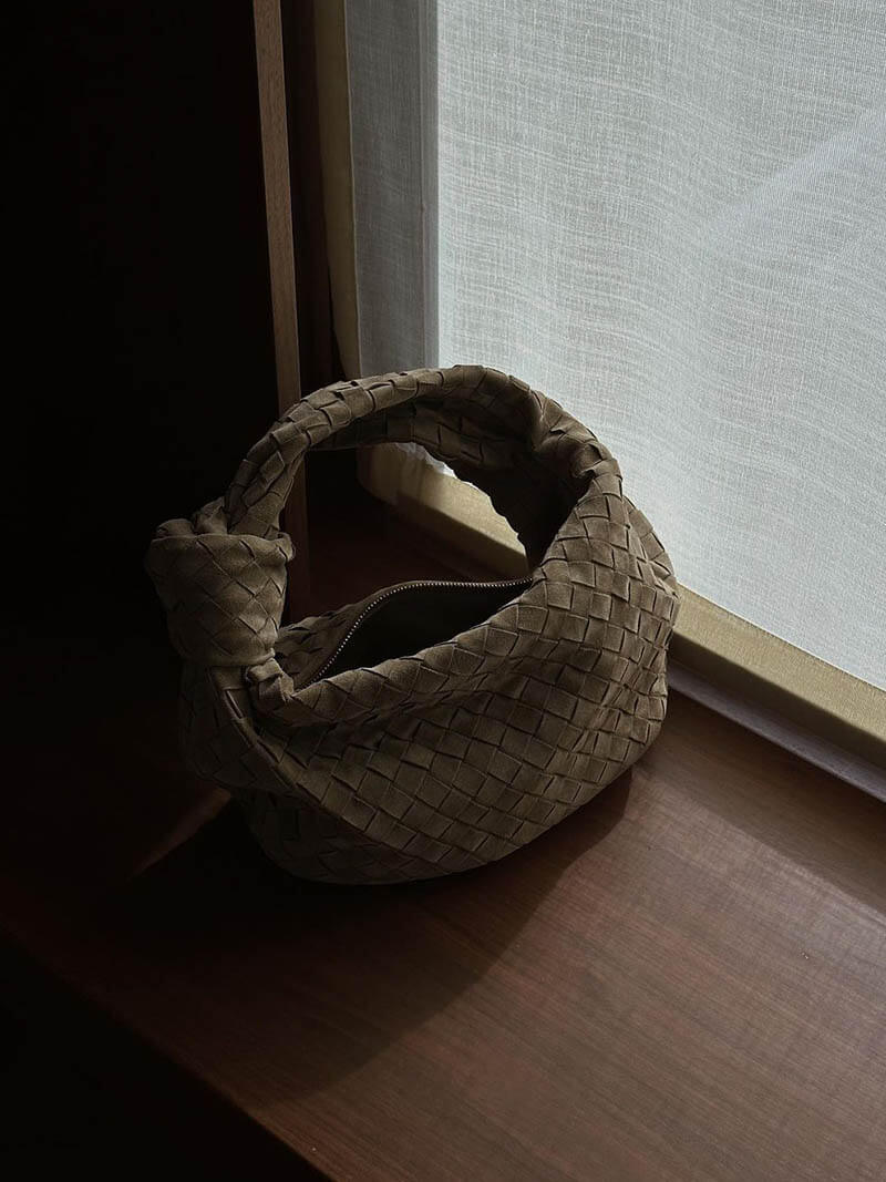 Women's compact braided suede mini handbag, stylish and practical.