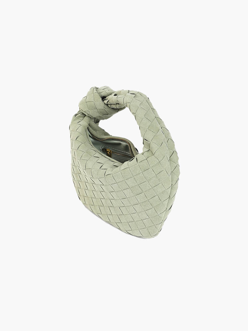 Chic braided suede mini handbag, ideal for fashion-forward women.