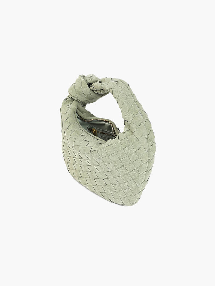 Chic braided suede mini handbag, ideal for fashion-forward women.