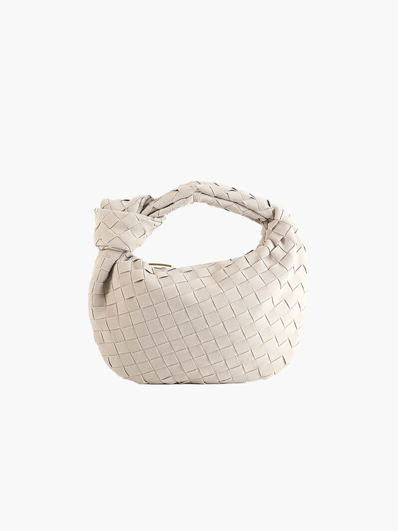 Women's daily accessory: compact braided suede mini bag, very elegant.