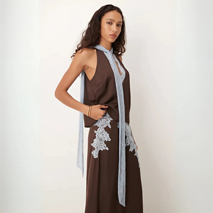 Chic brown lace panel two-piece set for women, featuring a halter top and flowing maxi skirt. Summer fashion.