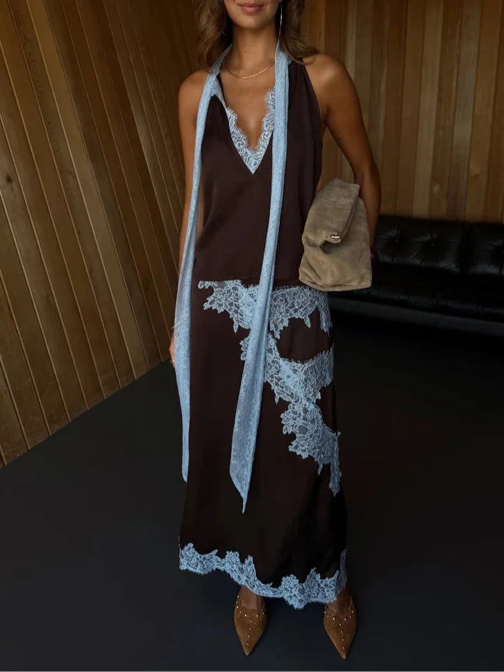 Women's stylish brown two-piece set with a lace panel maxi skirt and a matching halter top. Summer fashion.