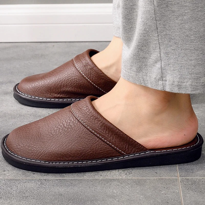 Women's elegant brown leather house shoes, soft and comfortable slippers for home wear.